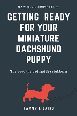 Getting ready for a miniature dachshund puppy by Laird, Tammy L.