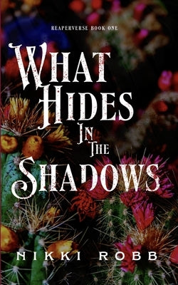 What Hides in the Shadows by Robb, Nikki