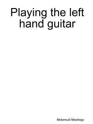 Playing the left hand guitar by Mashego, Molamudi