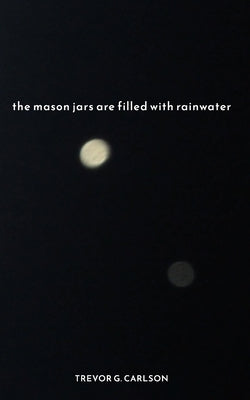 The mason jars are filled with rainwater by Carlson, Trevor G.